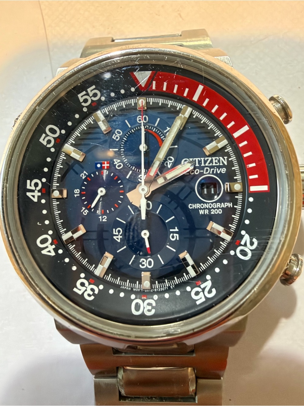 Citizen Blue Dial Chronograph Watch with Red Bezel Accent